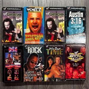Vintage WWF WCW VHS Lot 8 Tapes WrestleMania Unforgiven The Rock Goldberg Austin
